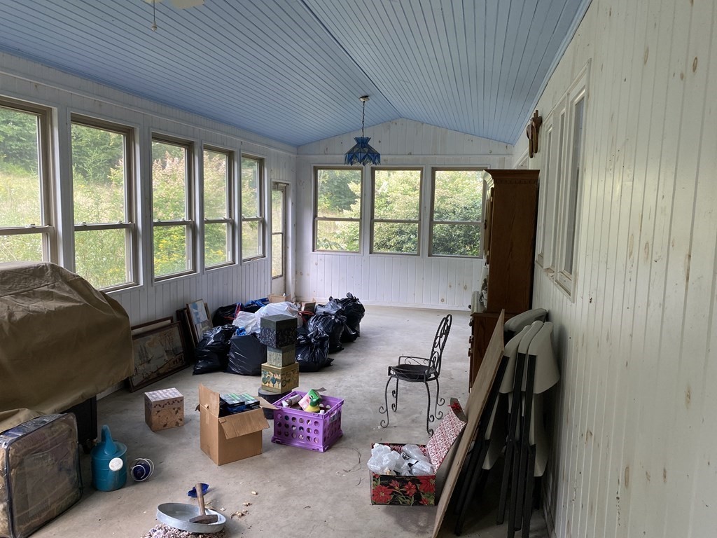 54 Holcomb Road Chester, MA 01011 - Photo 4 of 25 a room with furniture and a window