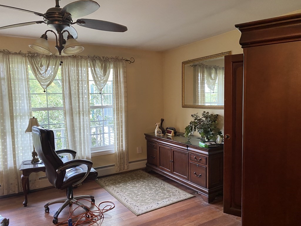 54 Holcomb Road Chester, MA 01011 - Photo 9 of 25 a living room with furniture and a window