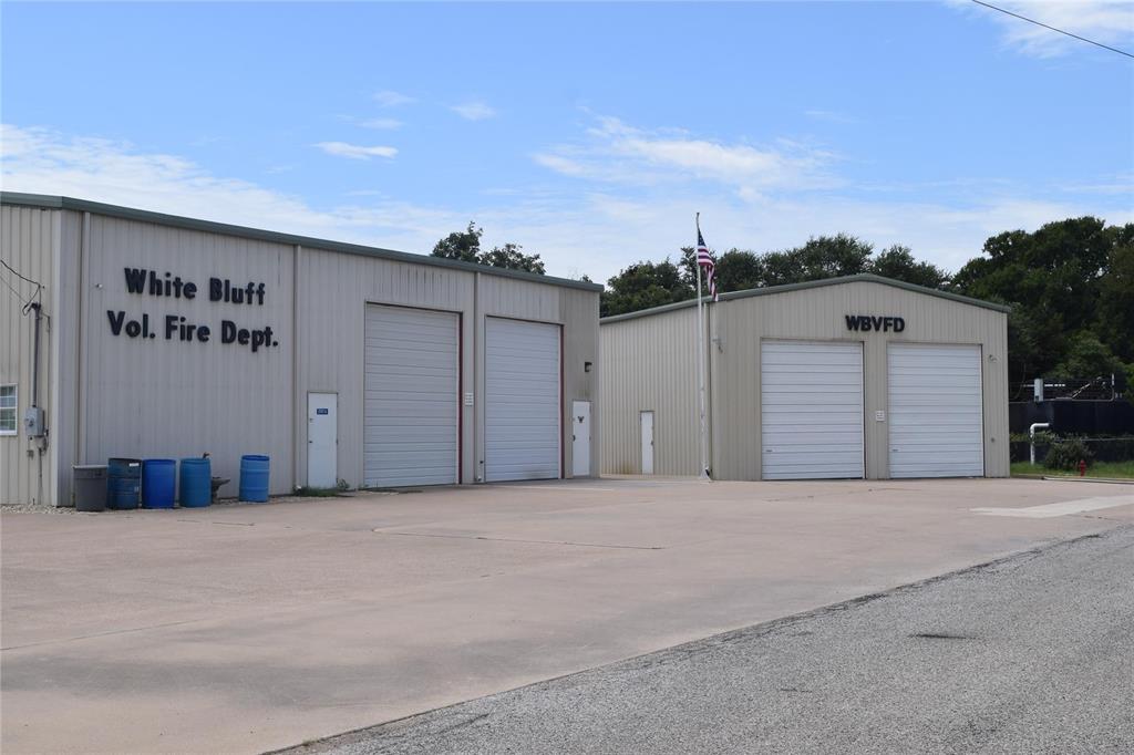 38037 Brookside Drive Whitney, TX 76692 - Photo 9 of 13 a view of the house with a garage