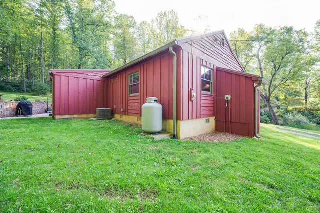 a view of a balcony with mountain view and wooden floor