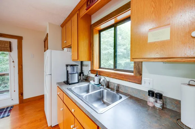a view of a livingroom with wooden floor