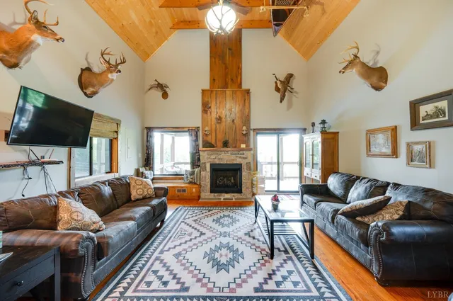 a kitchen with stainless steel appliances granite countertop a sink and a refrigerator