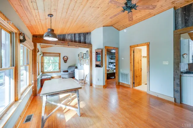 a kitchen with a stove and a wooden cabinets