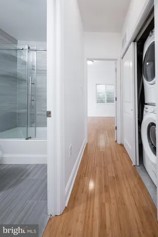 a bathroom with a toilet and a bathtub