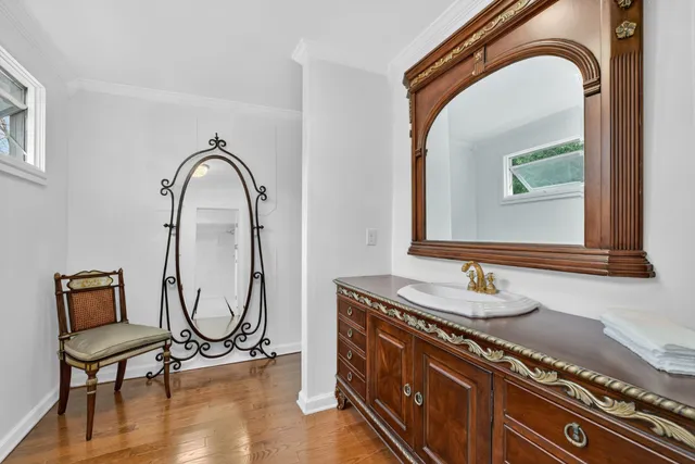 a view of a livingroom with furniture and windows