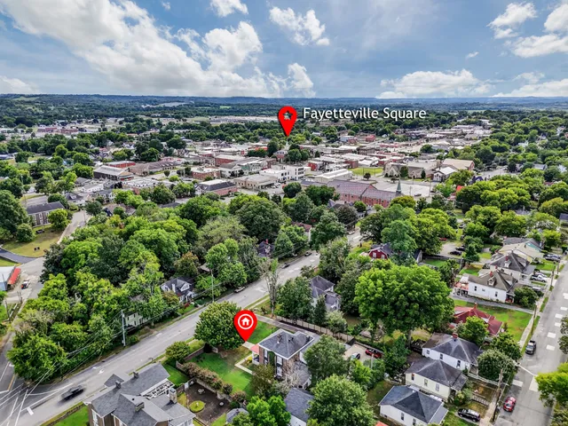 a bedroom with a bed and a rug