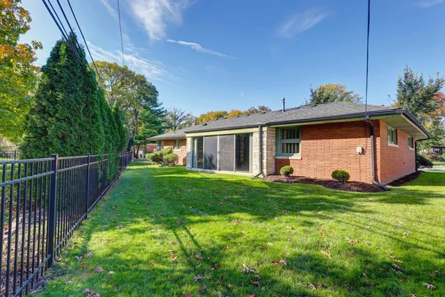 a view of a house with a big yard