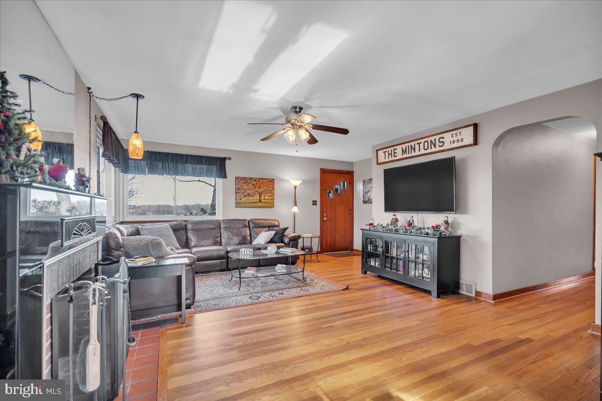 68 Riverside Avenue Roebling, NJ 08554 - Photo 2 of 33 a living room with furniture and a flat screen tv