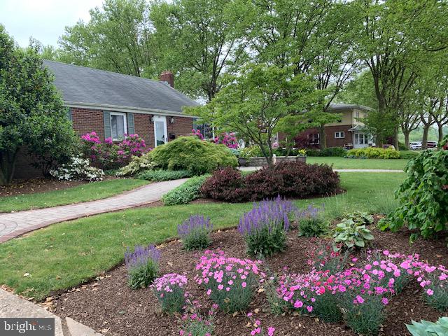 68 Riverside Avenue Roebling, NJ 08554 - Photo 30 of 33 a view of a house with a big yard and potted plants