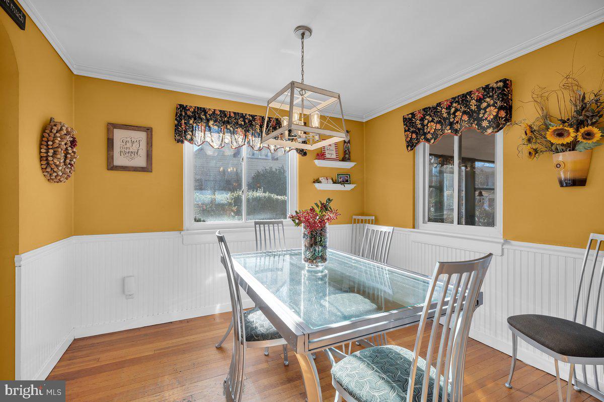 68 Riverside Avenue Roebling, NJ 08554 - Photo 4 of 33 a dining room with a table and chairs