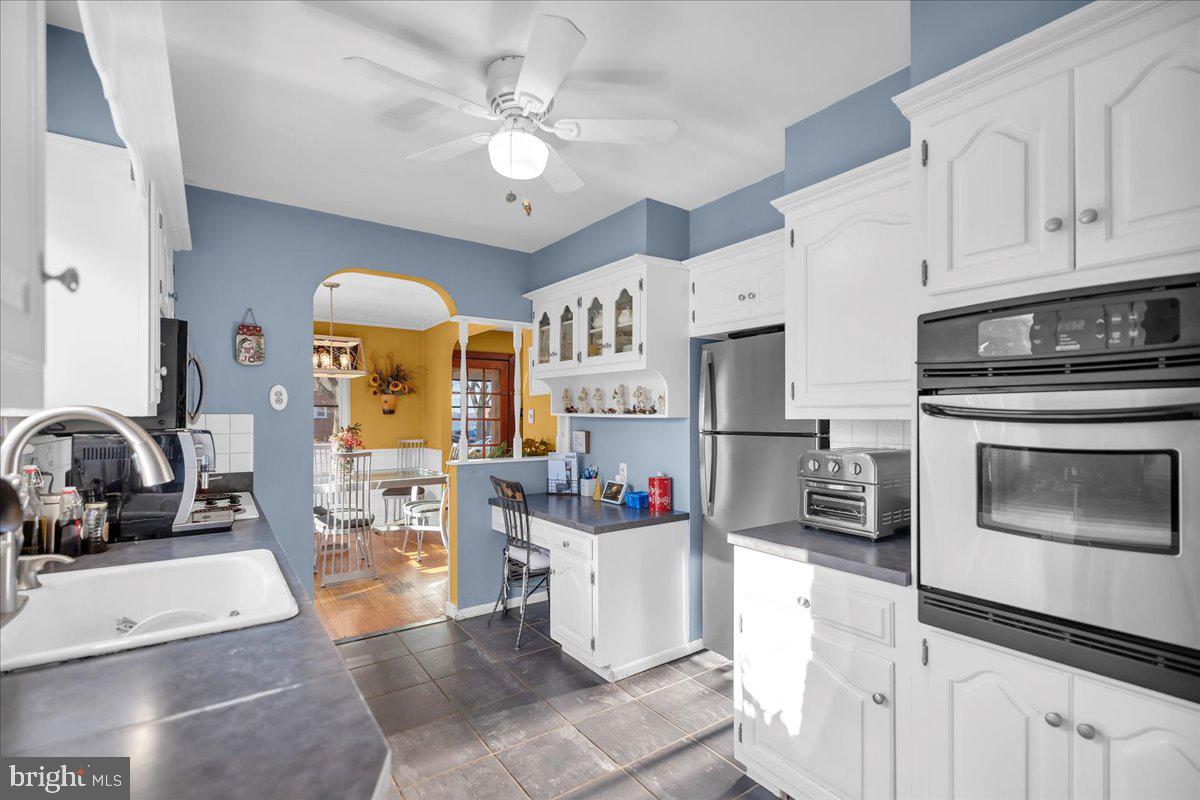 68 Riverside Avenue Roebling, NJ 08554 - Photo 5 of 33 a kitchen with cabinets and window