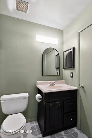 a bathroom with a shower and a shower