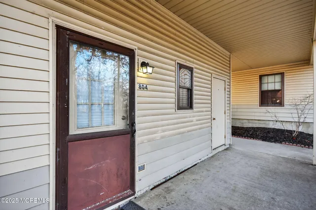a view of a house with a large window