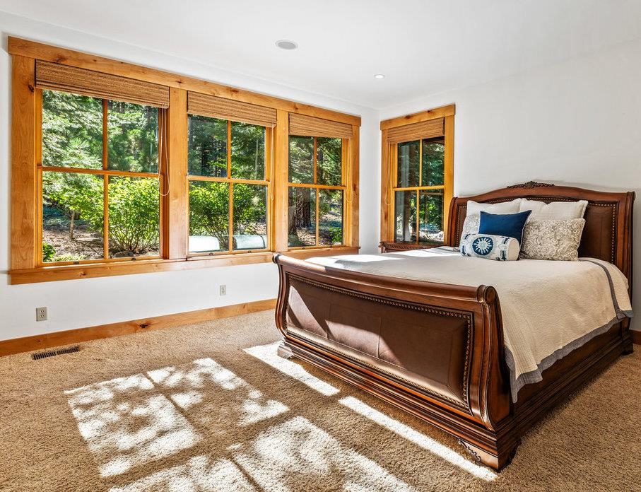 604 Ej Brickell Truckee, CA 96161 - Photo 13 of 21 a bed sitting in a bedroom next to a window