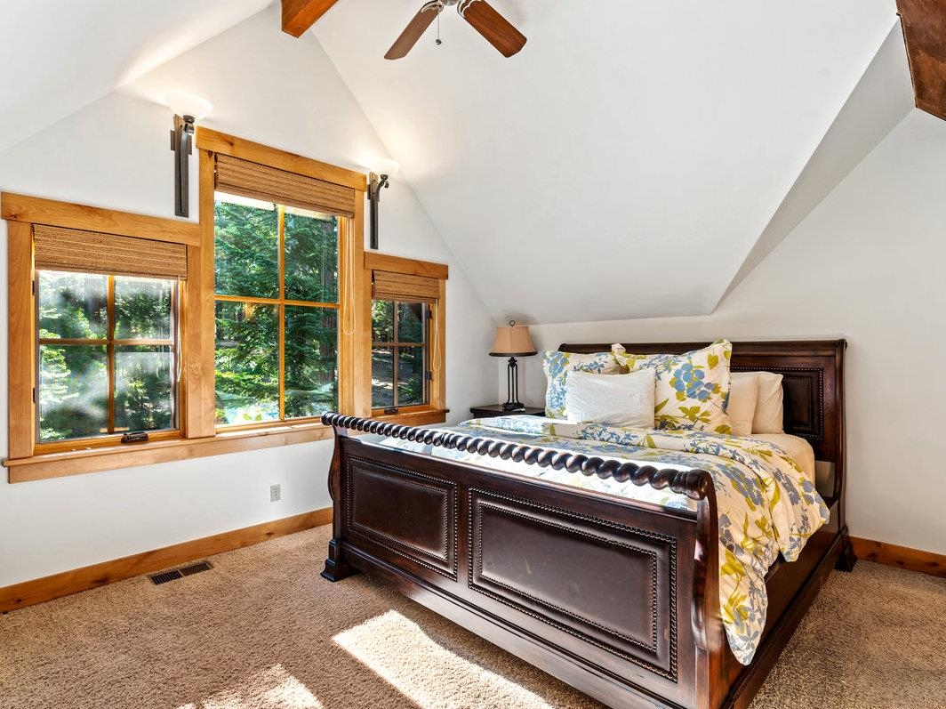604 Ej Brickell Truckee, CA 96161 - Photo 16 of 21 a bedroom with a bed and a window