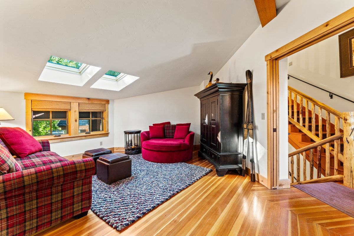 604 Ej Brickell Truckee, CA 96161 - Photo 19 of 21 a living room with furniture rug and wooden floor