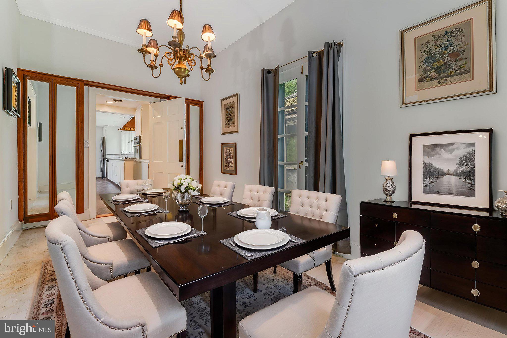 592 Province Line Road Hopewell, NJ 08525 - Photo 10 of 70 a view of a dining room with furniture large window and wooden floor