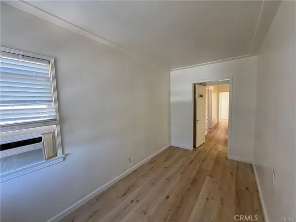 a view of a bathroom from the hallway