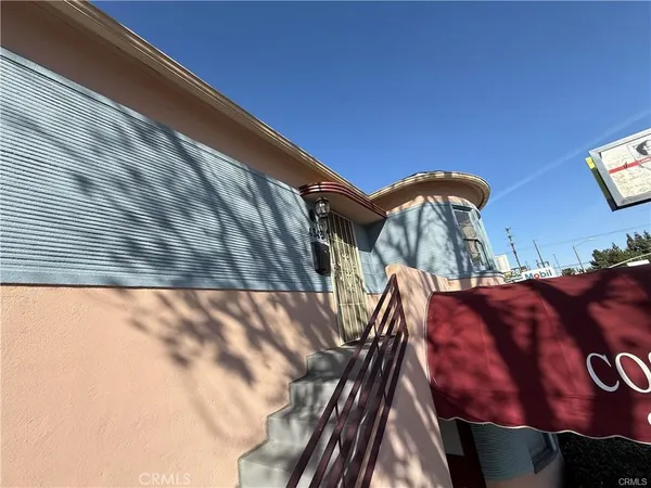 a view of balcony with furniture