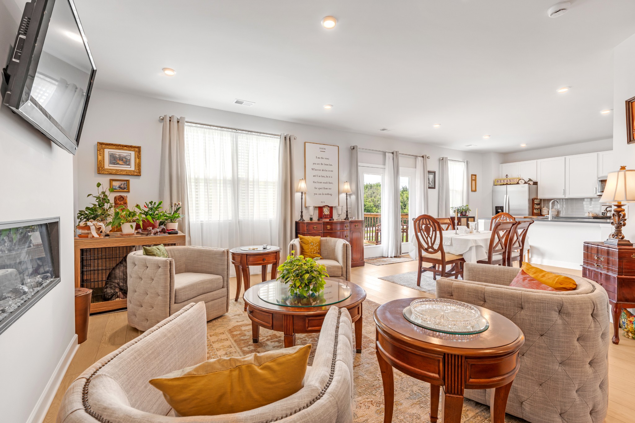 127 Millbrook Dr Spring Hill Spring Hill, TN 37174 - Photo 11 of 33 a living room with furniture a dining table and a fireplace