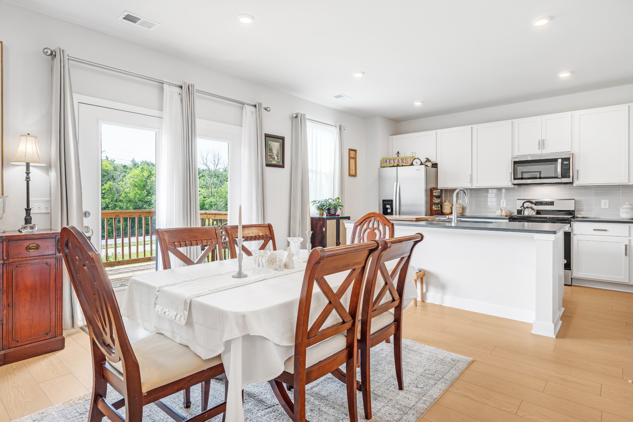127 Millbrook Dr Spring Hill Spring Hill, TN 37174 - Photo 12 of 33 a dining room with furniture a window and kitchen view