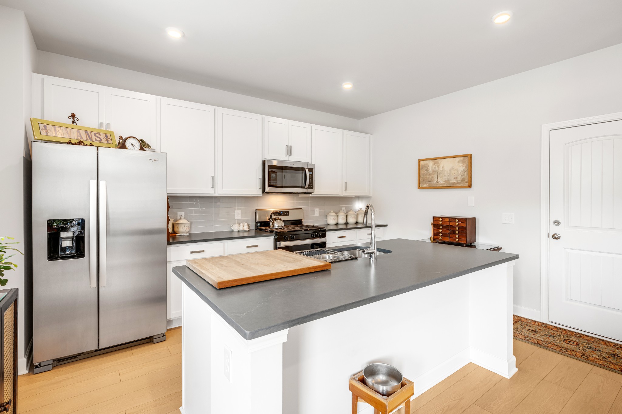127 Millbrook Dr Spring Hill Spring Hill, TN 37174 - Photo 14 of 33 a kitchen with granite countertop a refrigerator and a sink