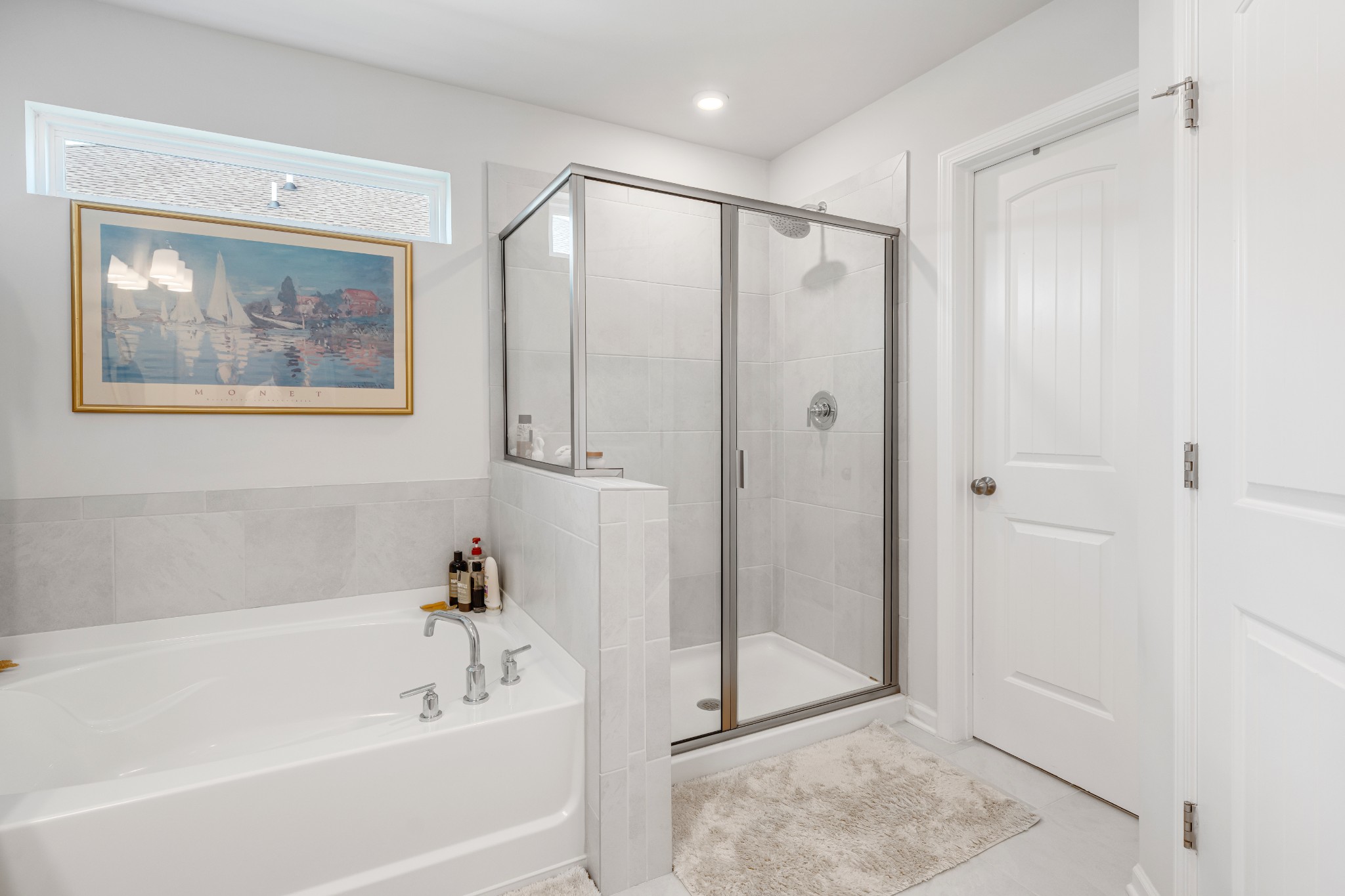 127 Millbrook Dr Spring Hill Spring Hill, TN 37174 - Photo 21 of 33 a bathroom with a bathtub and a shower