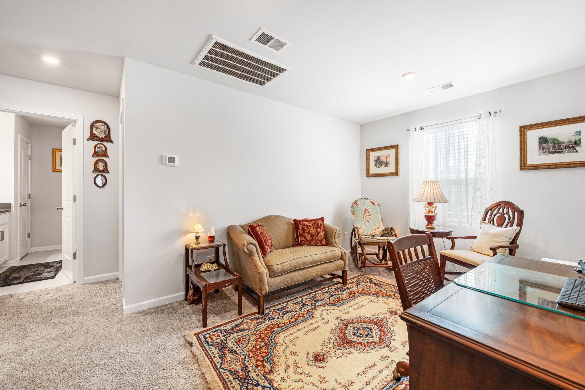 127 Millbrook Dr Spring Hill Spring Hill, TN 37174 - Photo 24 of 33 a living room with furniture and wooden floor