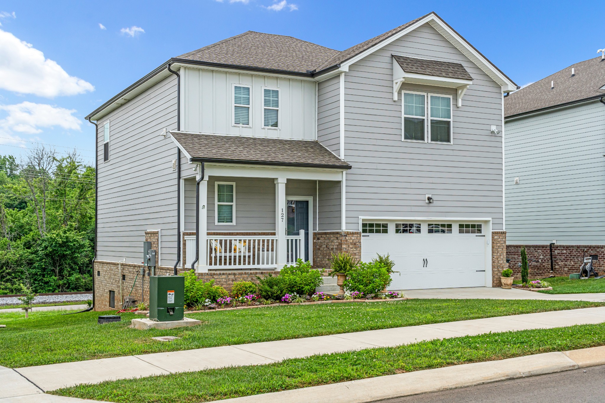 127 Millbrook Dr Spring Hill Spring Hill, TN 37174 - Photo 4 of 33 a front view of a house with a yard