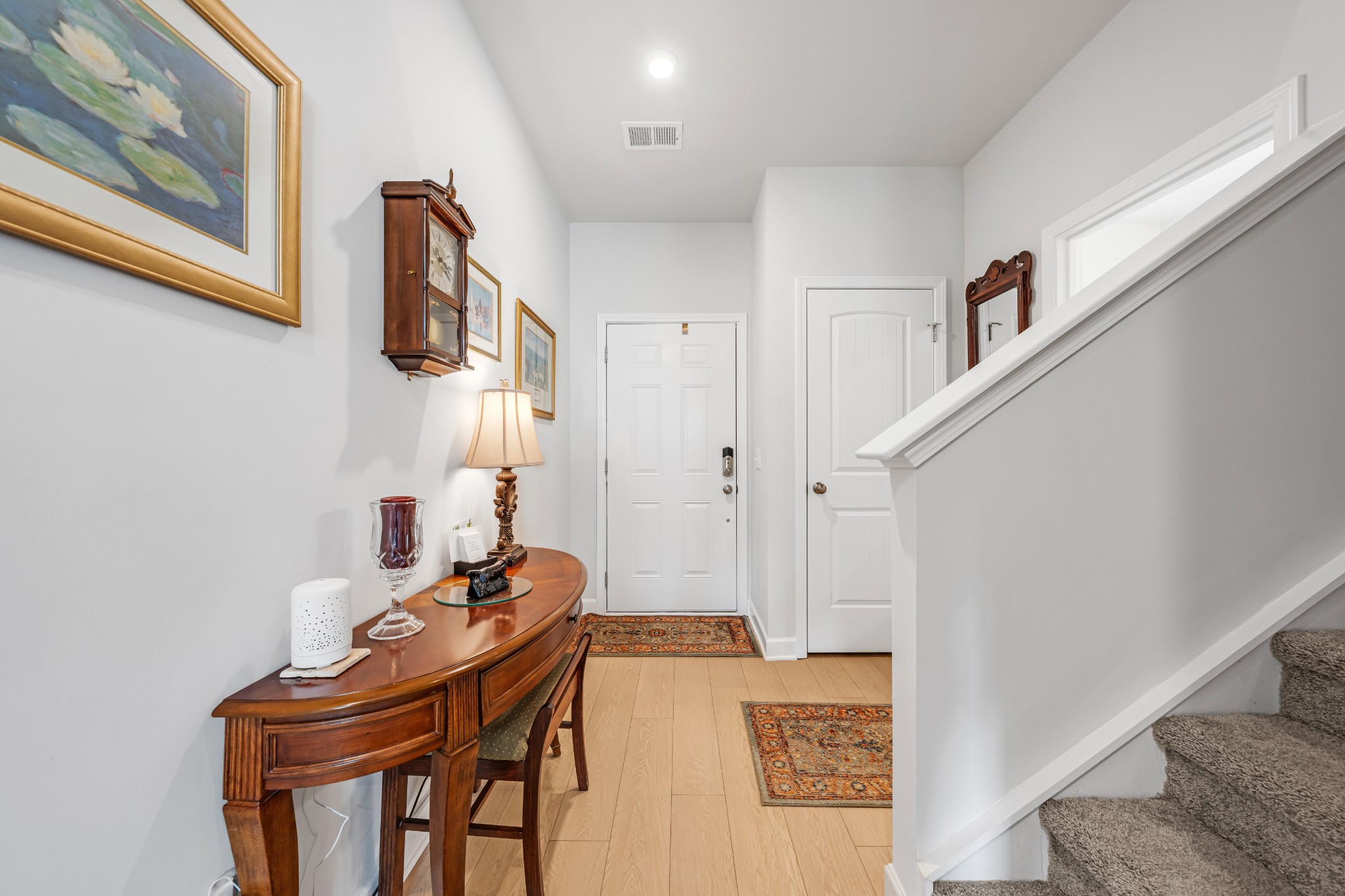 127 Millbrook Dr Spring Hill Spring Hill, TN 37174 - Photo 7 of 33 a living room with furniture and a wooden floor