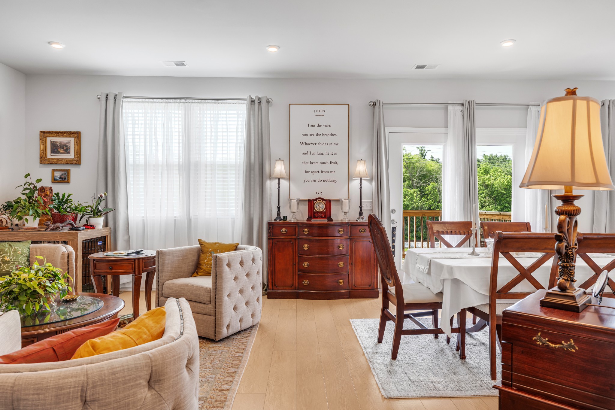 127 Millbrook Dr Spring Hill Spring Hill, TN 37174 - Photo 8 of 33 a living room with furniture a large window and a dining table