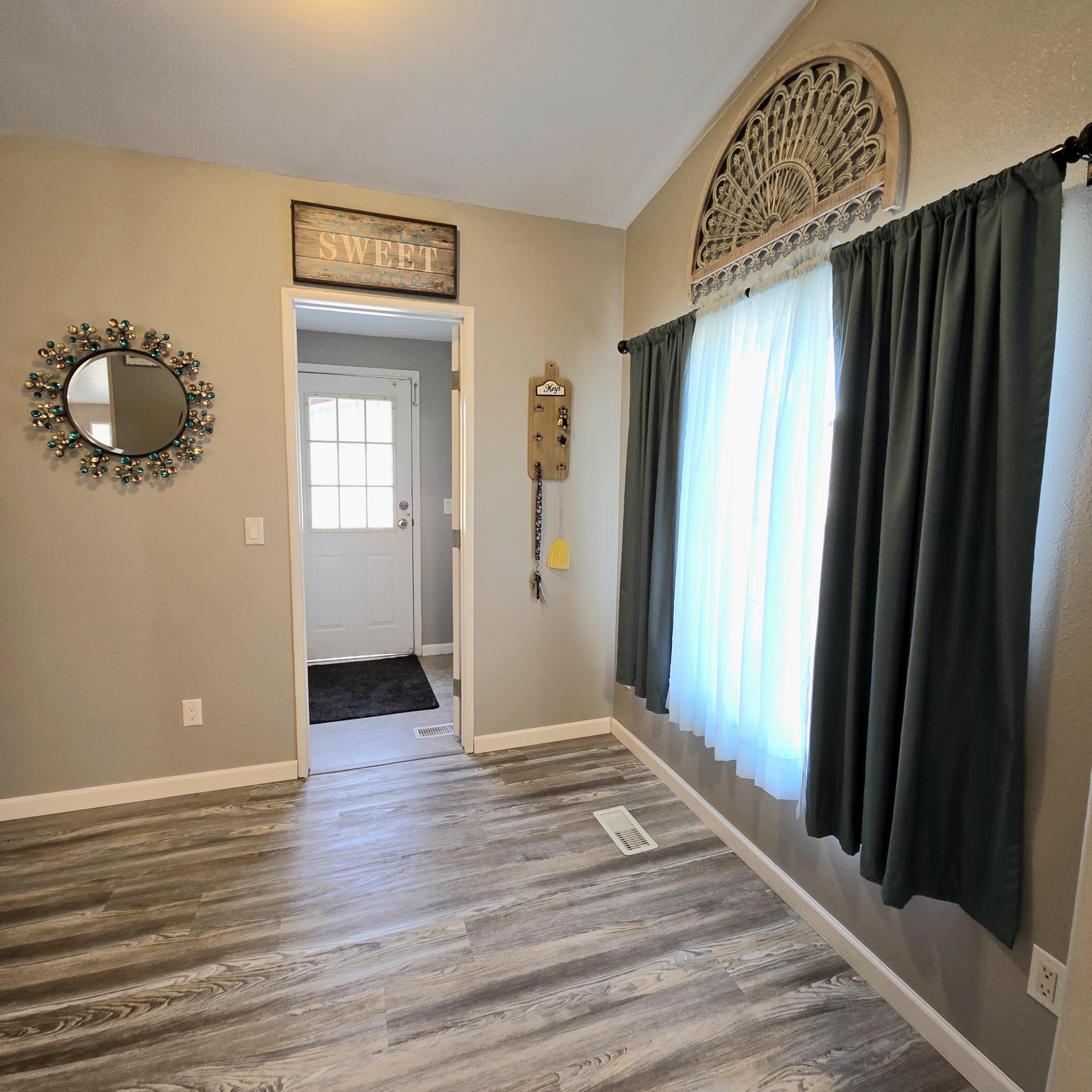 16617 Cottonwood Creek Road Hornbrook, CA 96044 - Photo 12 of 43 a view of an entryway with wooden floor