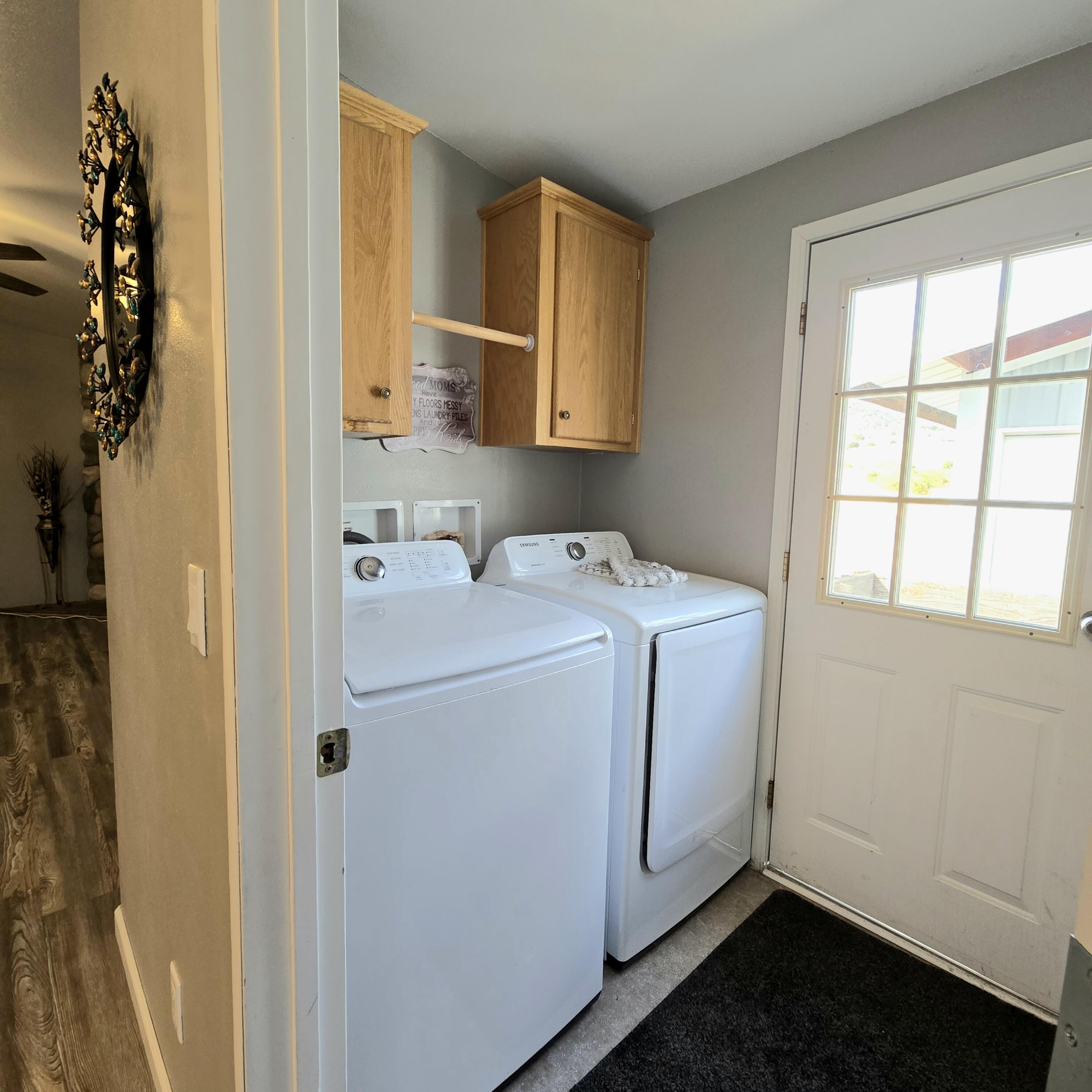 16617 Cottonwood Creek Road Hornbrook, CA 96044 - Photo 13 of 43 a utility room with dryer and washer