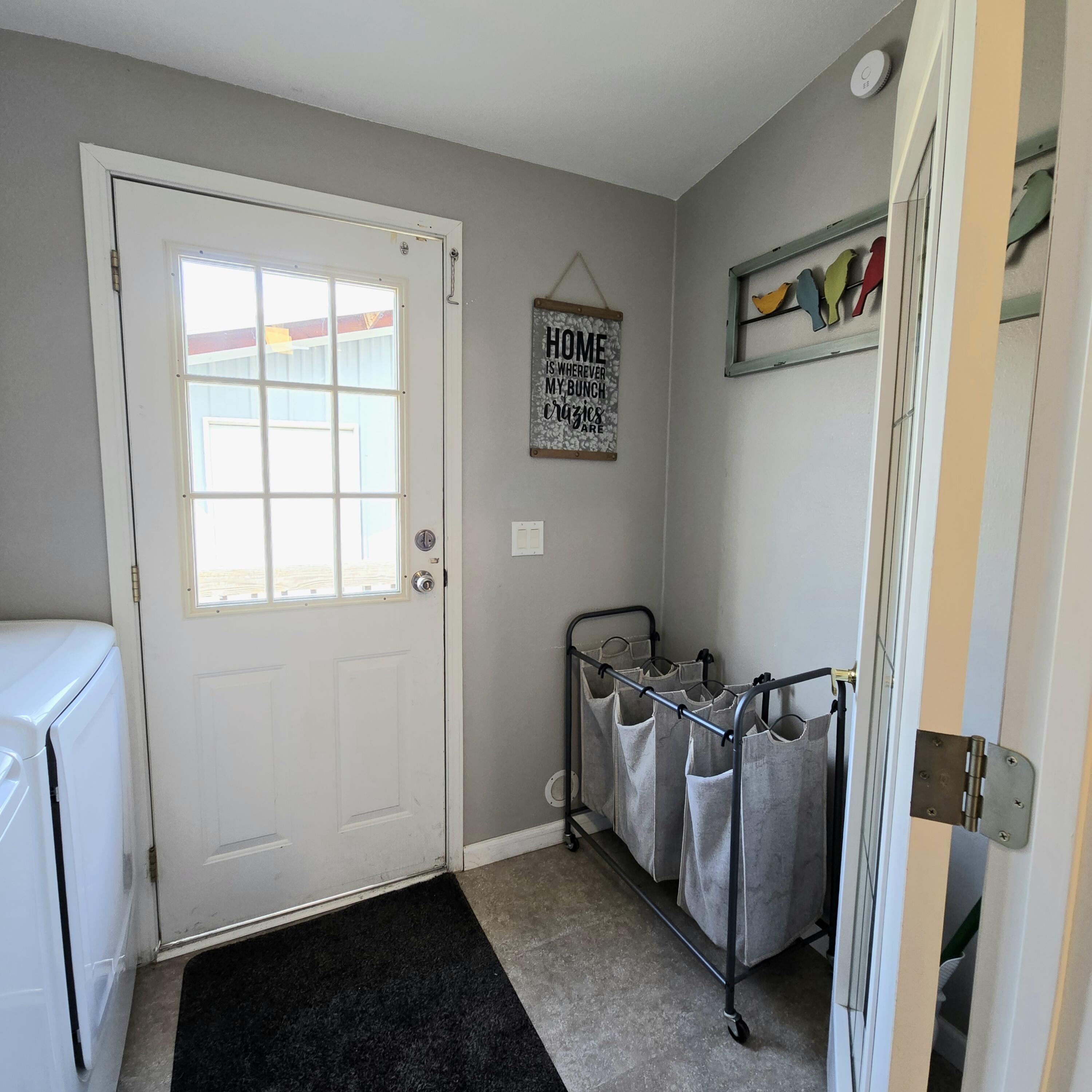 16617 Cottonwood Creek Road Hornbrook, CA 96044 - Photo 14 of 43 a living room with a couch and a window