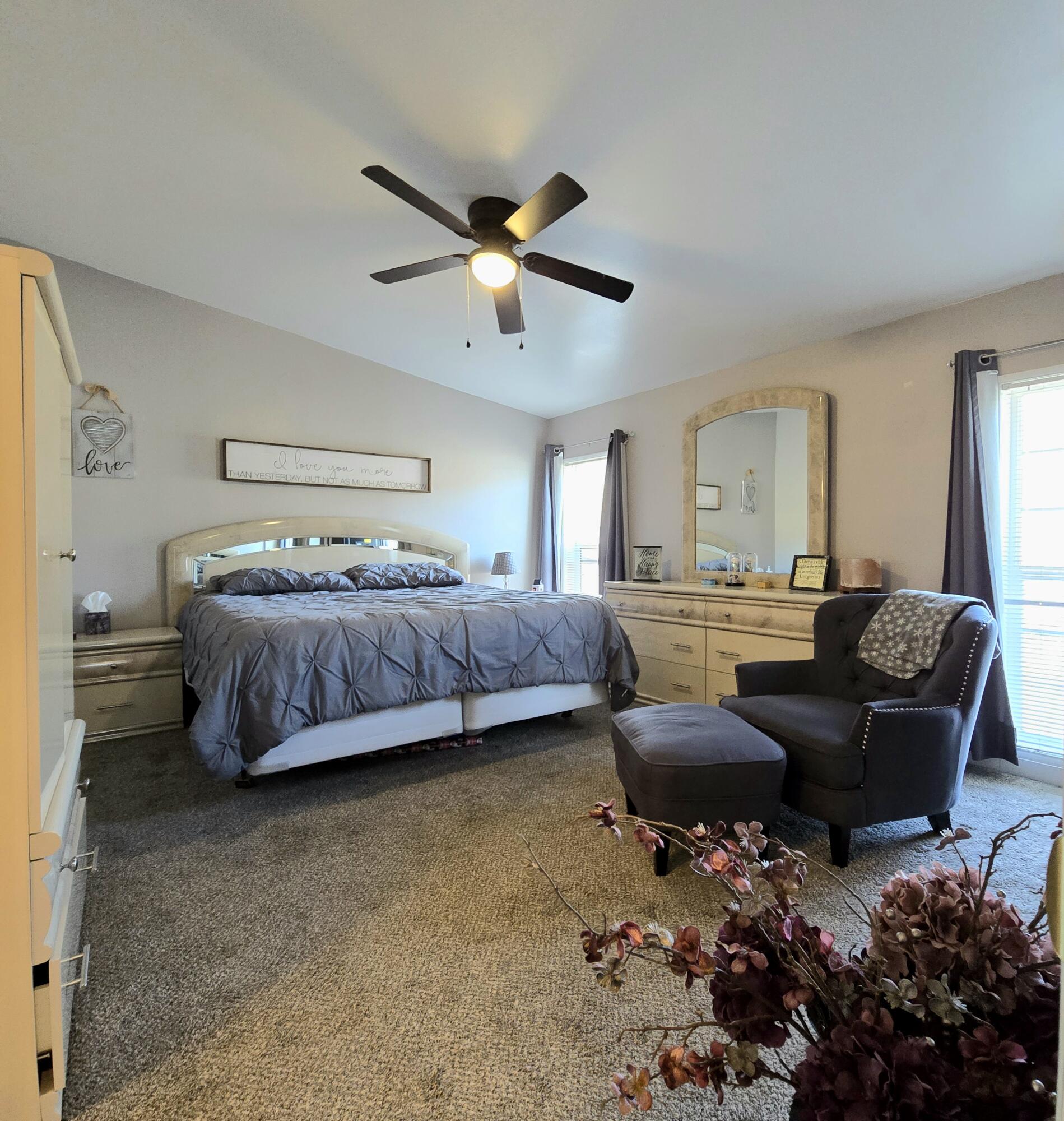 16617 Cottonwood Creek Road Hornbrook, CA 96044 - Photo 17 of 43 a bedroom with a bed dresser and a window