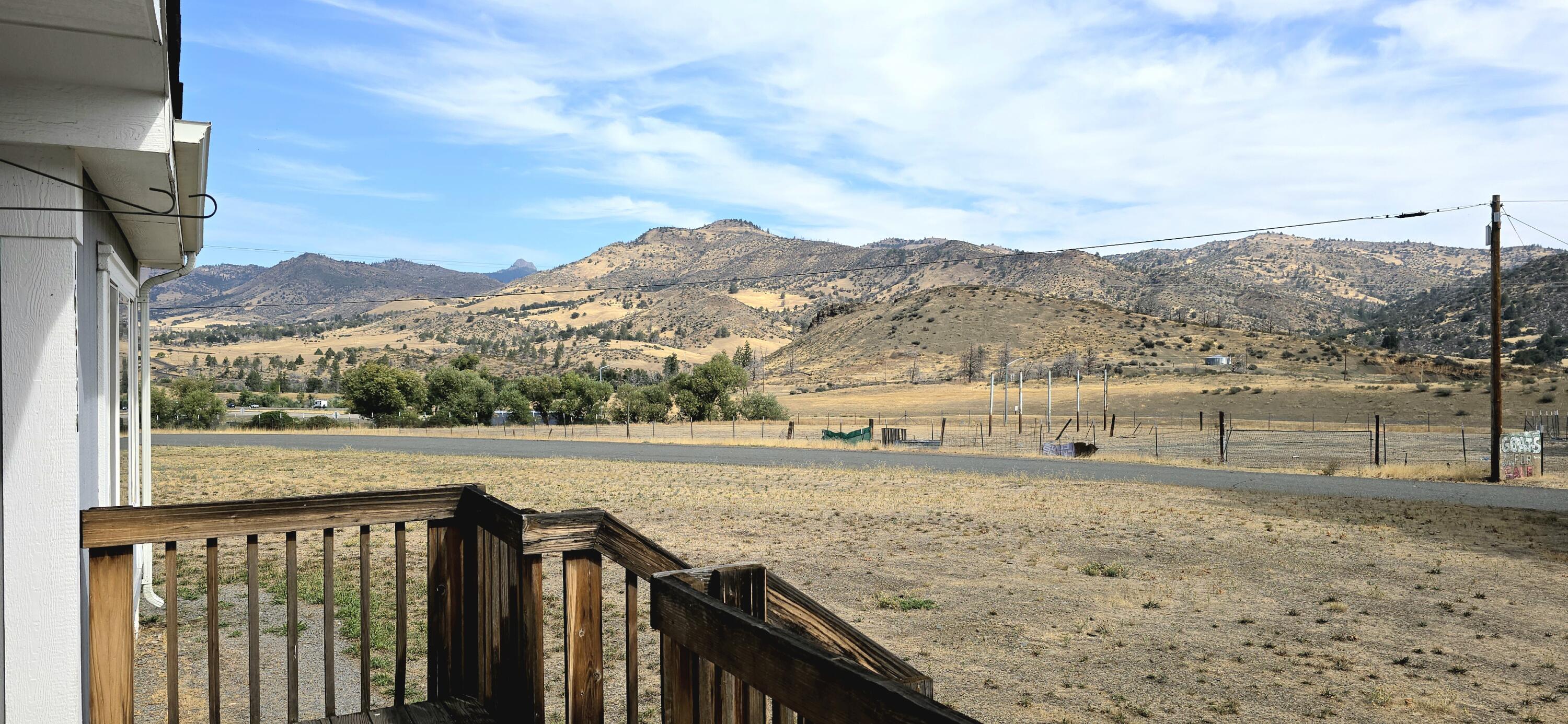 16617 Cottonwood Creek Road Hornbrook, CA 96044 - Photo 2 of 43 a view of a lake with a mountain