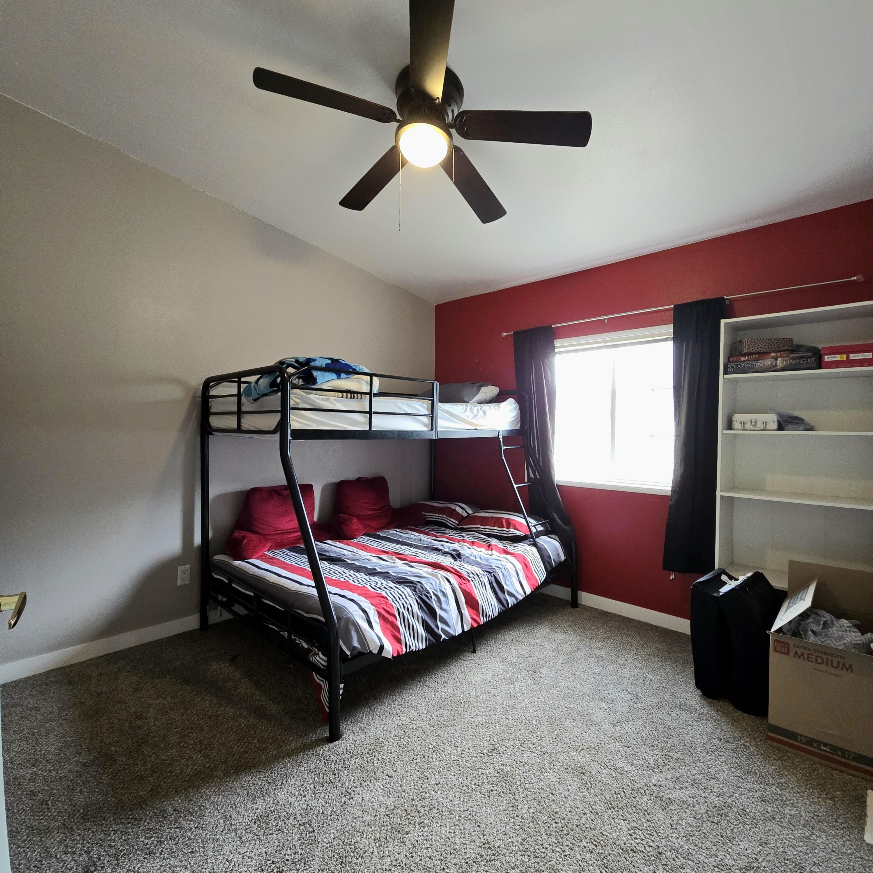 16617 Cottonwood Creek Road Hornbrook, CA 96044 - Photo 26 of 43 a bedroom with bed and window