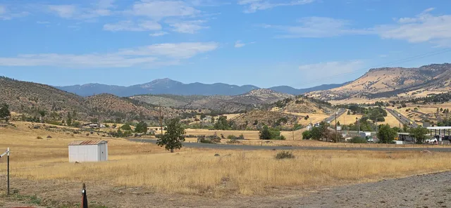 a view of a lake with mountains in the background