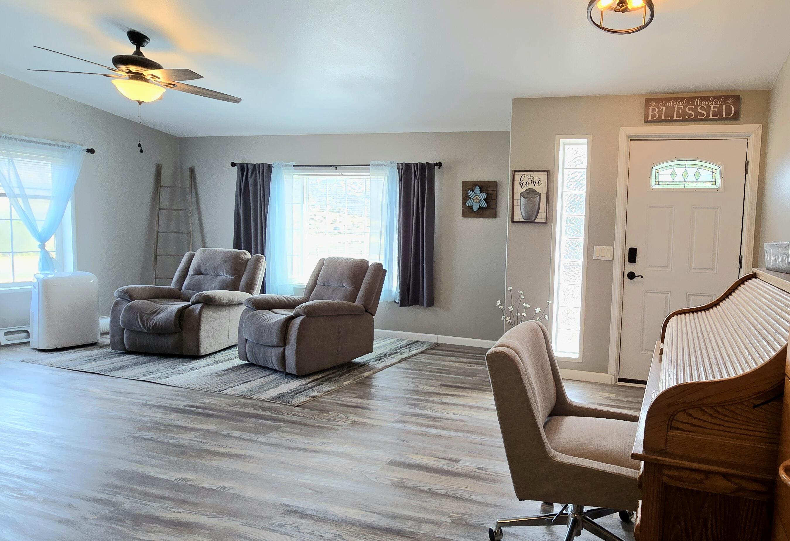 16617 Cottonwood Creek Road Hornbrook, CA 96044 - Photo 7 of 43 a living room with furniture and a window