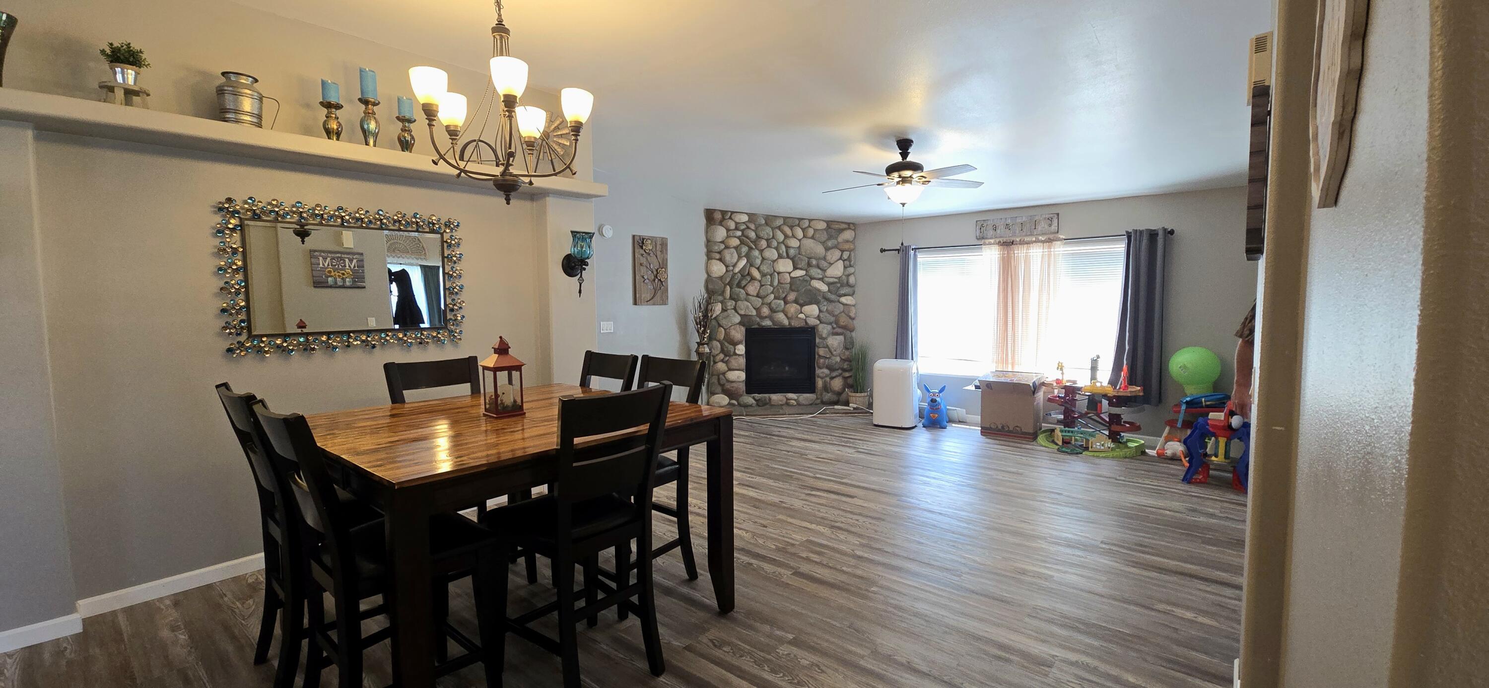 16617 Cottonwood Creek Road Hornbrook, CA 96044 - Photo 8 of 43 a view of a dining room with furniture window and wooden floor