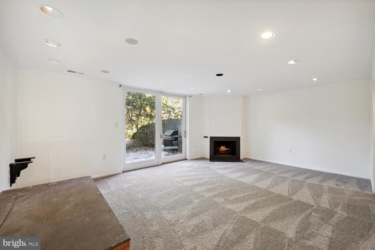 10959 Deborah Drive Potomac, MD 20854 - Photo 22 of 30 Expansive Rec Room w/ Fireplace