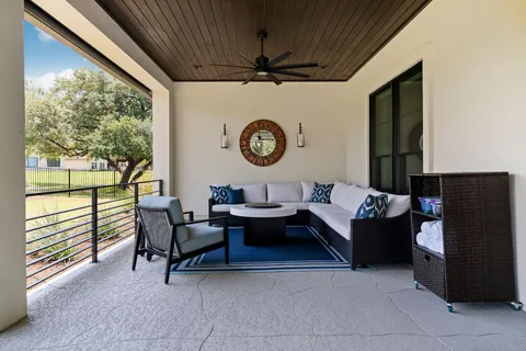 a view of backyard with seating space