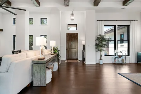 a kitchen with stainless steel appliances granite countertop a sink and cabinets