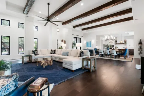 an aerial view of residential houses with outdoor space