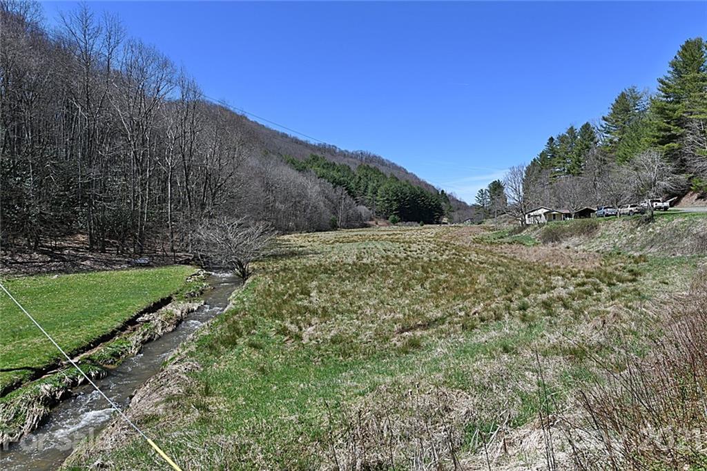 479 Joe Hampton Road Lansing, NC 28643 - Photo 2 of 44 a view of a road with a building in the background