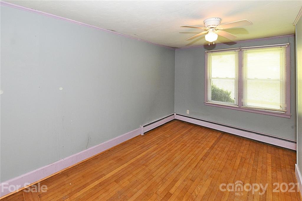 479 Joe Hampton Road Lansing, NC 28643 - Photo 21 of 44 an empty room with a window