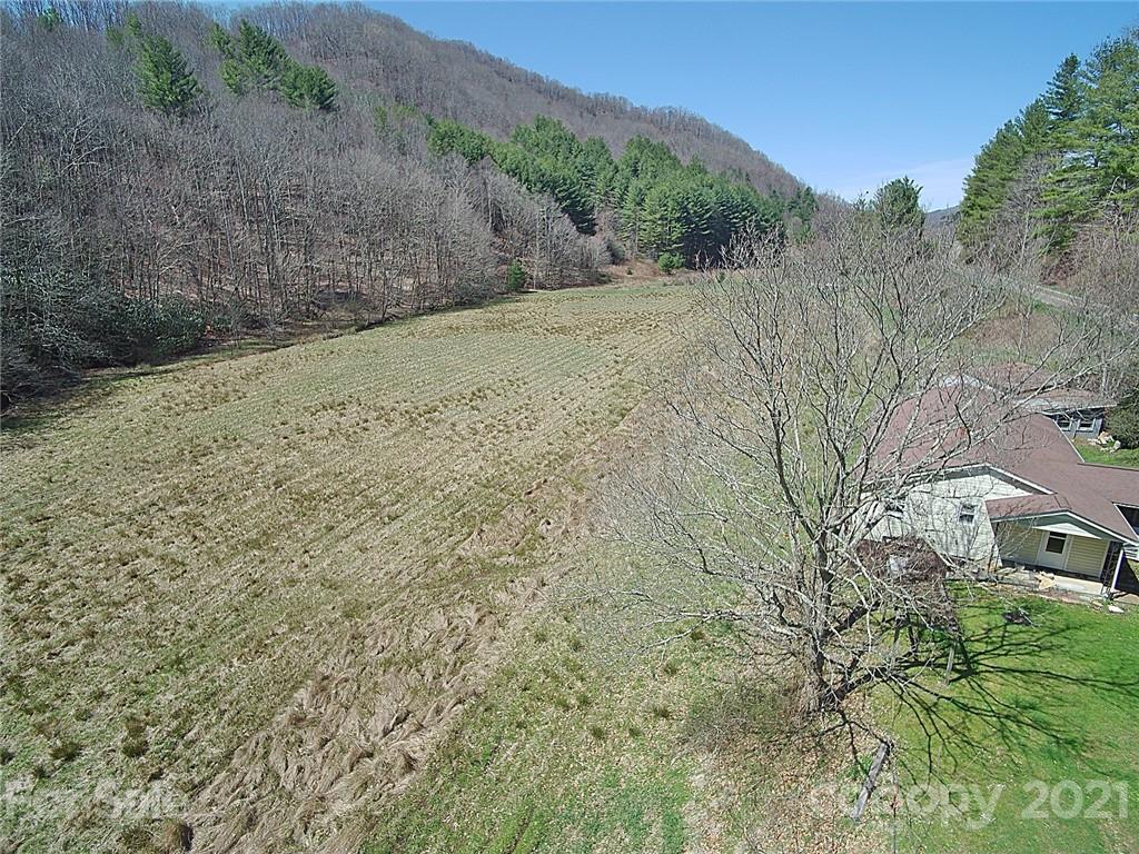479 Joe Hampton Road Lansing, NC 28643 - Photo 39 of 44 a view of a dry yard with mountain