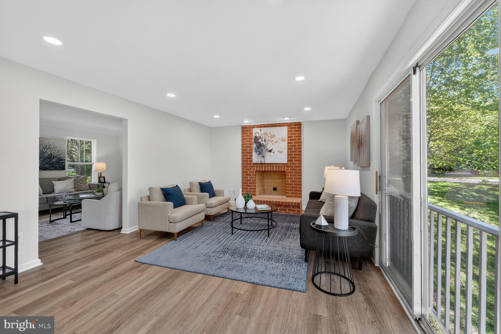 2339 Colts Brook Drive Reston, VA 20191 - Photo 13 of 51 a living room with furniture and a large window