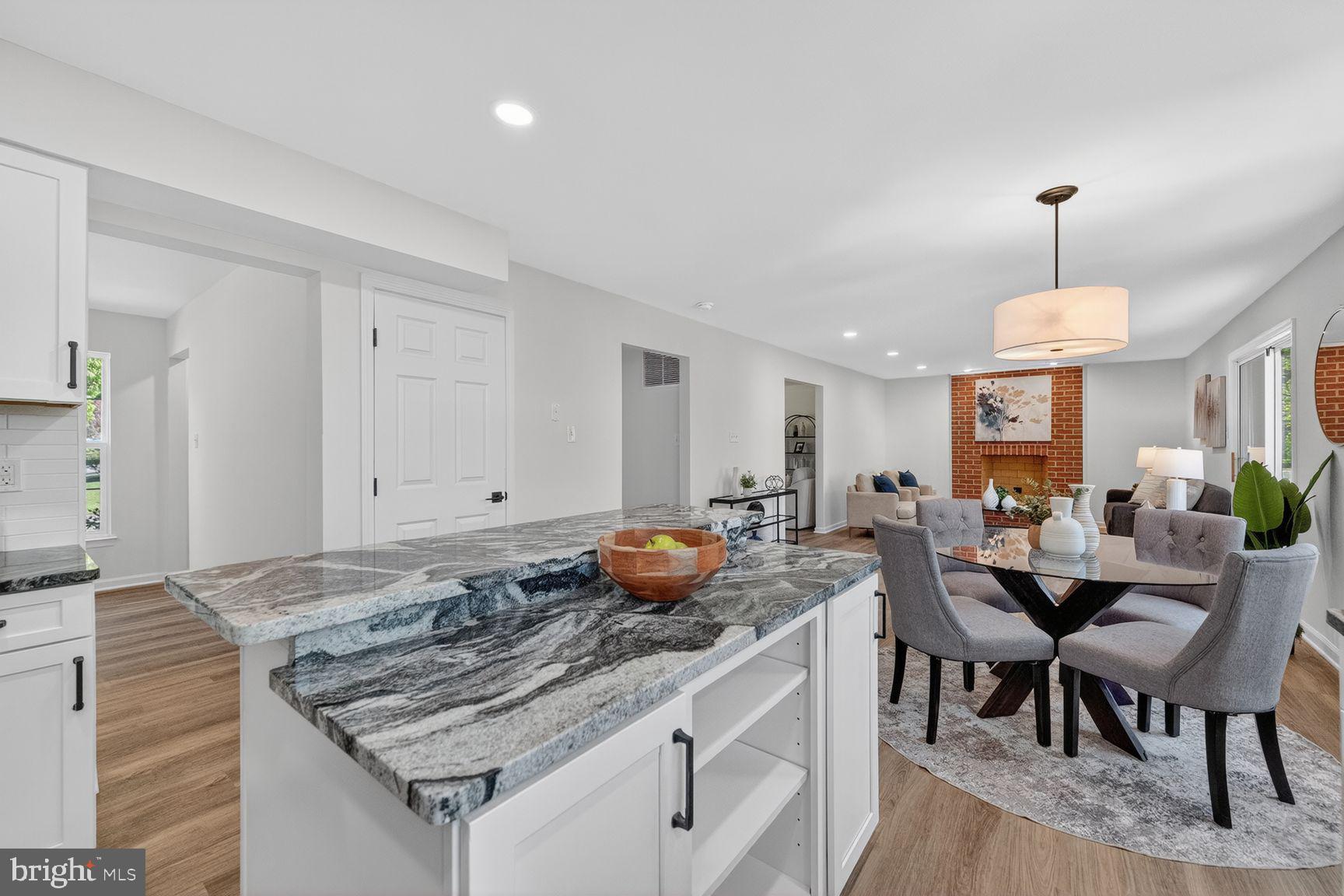 2339 Colts Brook Drive Reston, VA 20191 - Photo 22 of 51 a view of a a dining table and chairs in the kitchen