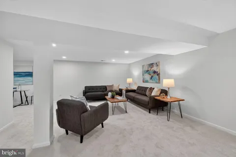 a living room with furniture and a couch